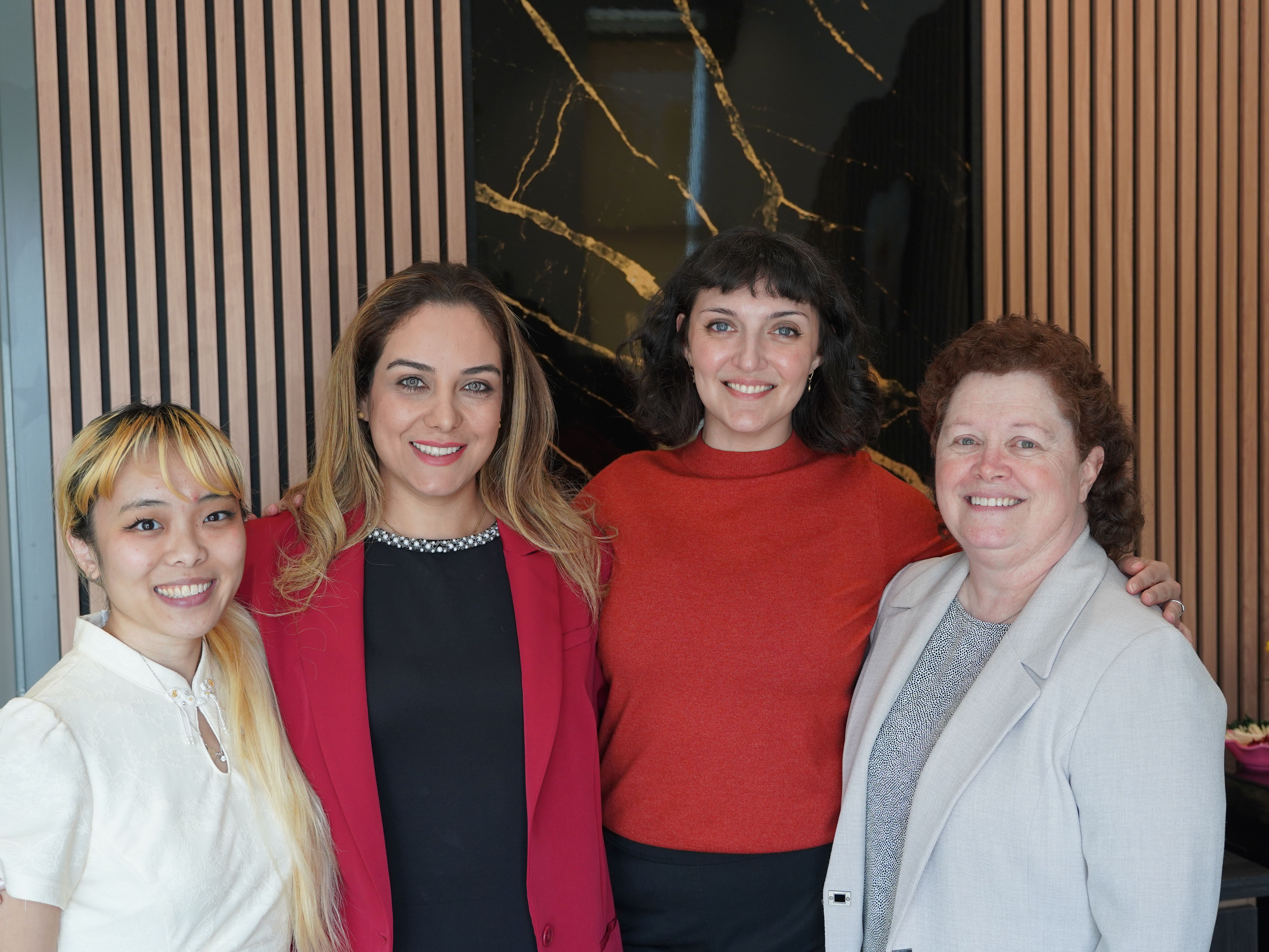 Dr. Nasim Doroudgar and two of her Lux Dentistry team members