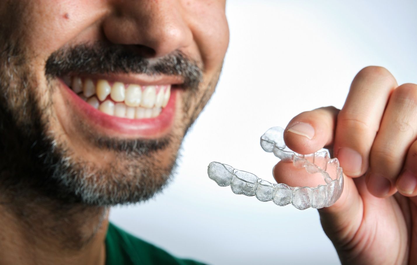 A man with clear aligners near Milton
